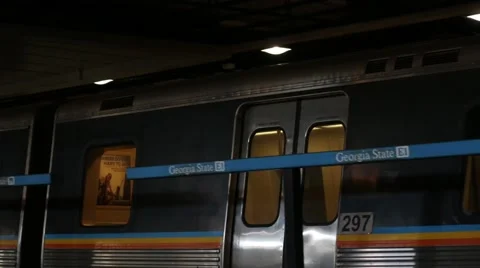 Marta train flying by walking commuters Stock Footage 45181662