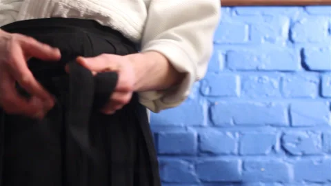 Martial art practitioner getting ready for training Stock Footage 89711964