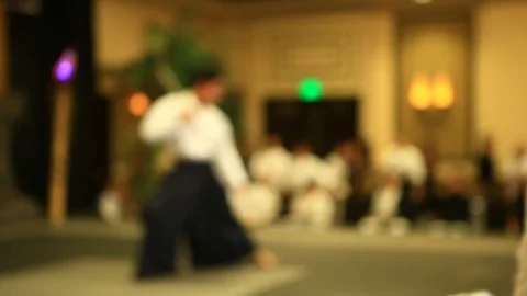 Martial Arts Competitor Performing Bo Staff Kata at Tournament Stock Footage 97806959