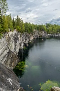 Marvel at the tranquil waters of Marble Canyon, surrounded by towering clif.. Stock Photos