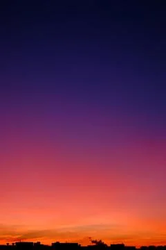 Marvelous gradient skyline during sunset in the city Stock Photos