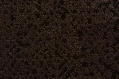 Marvelous textile background with dark brown surface. Stock Photos