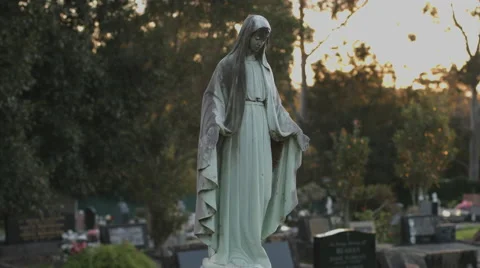 Mary Statue Gravestone At Sunset Stock Footage 51448762