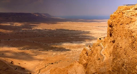 Masada Dead Sea Timelapse with clouds rolling over landscape Video stock 125547399