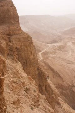 Masada mountain in the haze Stock Photos