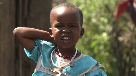 Masai child face with flies Stock Footage 33687977