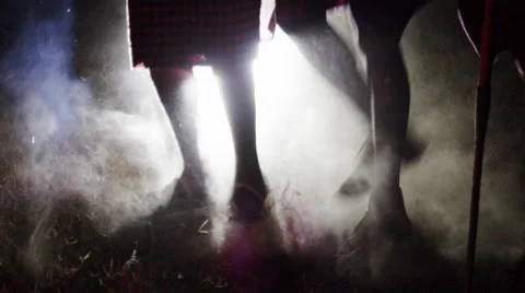Masai Dancing and Jumping in Slow Motion with dust Feet close Up Stock Footage 41610792