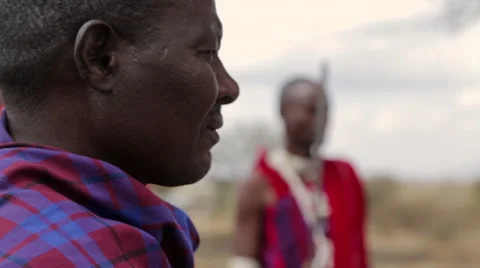 Masai Men In Circle, One With Spear in Tanzania Stock Footage 42401887