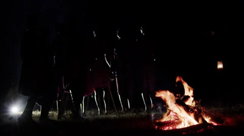Masai Standing Around a Bonfire Video stock 41611267