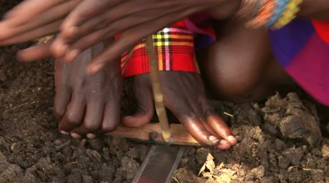 Masai traditional fire kindling Stock Footage 33688053