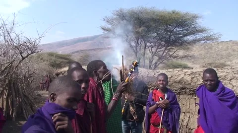 Masai tribesmen are making fire. Tanzania Video stock 55930410