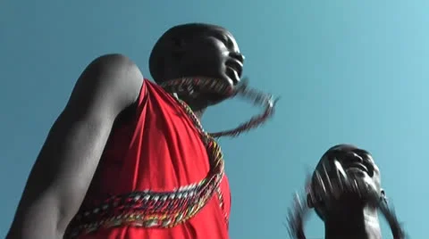 Masai Warrior dancing and singing in Manyatta in Kenya Video stock 27157666