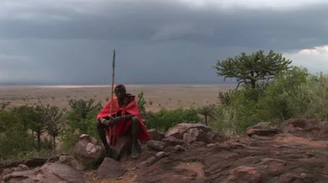 Masai warrior sitting Stock Footage 24655952