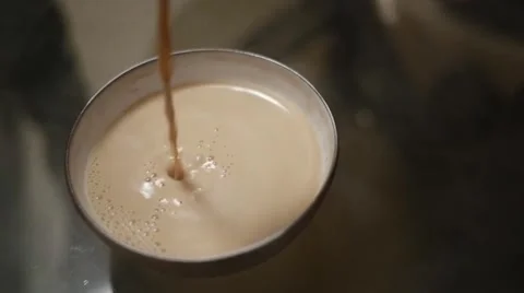 Masala tea being poured in cup in super slow motion Stock Footage 43247807