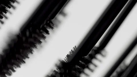 Mascara brushes macro on white Stock Footage 91070237