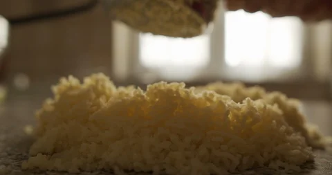 Mash boiled potatoes to prepare dumplings close up Stock Footage 129067555