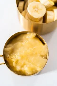 Mashed and sliced bananas Stock Photos