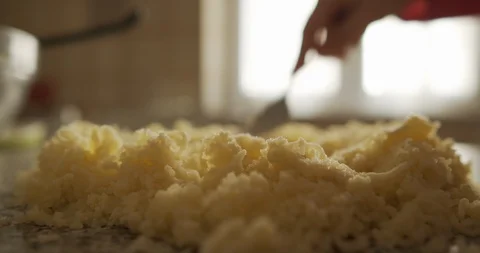 Mashed boiled potatoes to prepare the dumplings Stock Footage 129067140