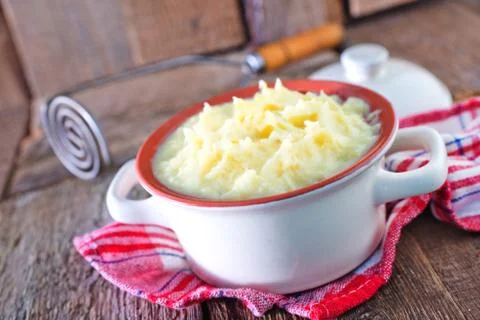 Mashed potato in bowl on a table Stock Photos