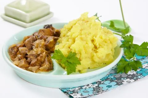 Mashed potato with mushroom sauce Stock Photos