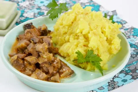 Mashed potato with mushroom sauce Stock Photos