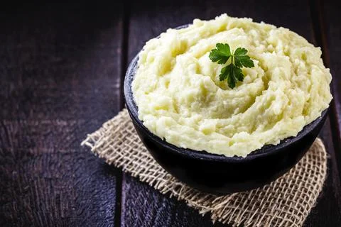 Mashed potato, potato cream in rustic kitchen Stock Photos