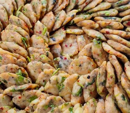 Mashed potato in round shape, ready for cook.Locally called Alur Chop. Stock Photos
