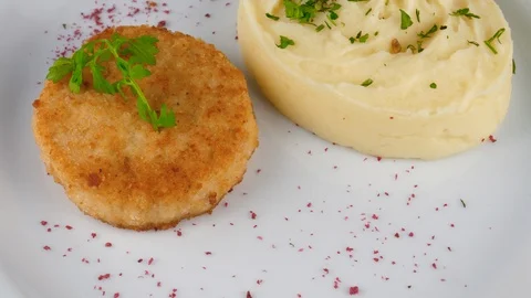 Mashed potato served with roasted meat cutlet, Restaurant food Stock Footage 95152713