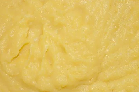Mashed potato texture.Homemade mashed potatoes.Boiled grated potatoes. Stock Photos