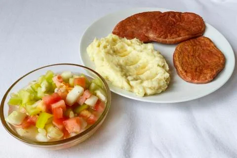 Mashed potatoes and hamburger view Stock Photos