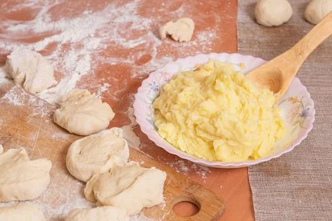 The mashed potatoes are prepared for baking homemade buns Фото