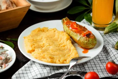 Mashed potatoes with baked zucchini Stock Photos