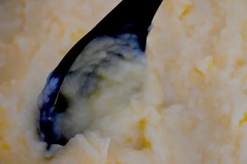 Mashed potatoes close-up with spoon Foto stock
