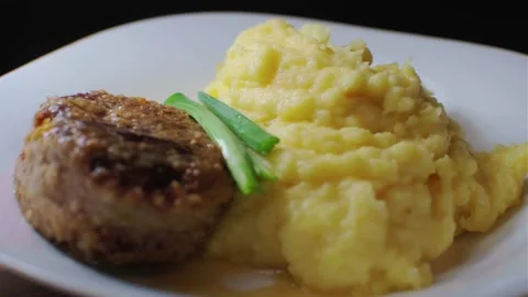 Mashed potatoes with cutlet Stock Footage 237818136