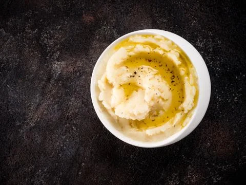 Mashed potatoes on dark concrete background Stock Photos