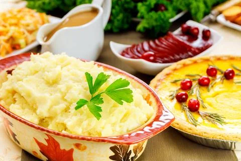 Mashed potatoes on festive table for Thanksgiving Day. Stock Photos