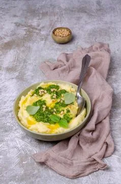 Mashed potatoes with green sauce Stock Photos