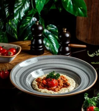 Mashed potatoes with meat sauce Stock Photos