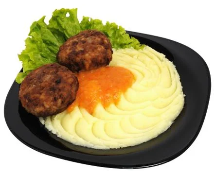 Mashed potatoes with meatballs Stock Photos