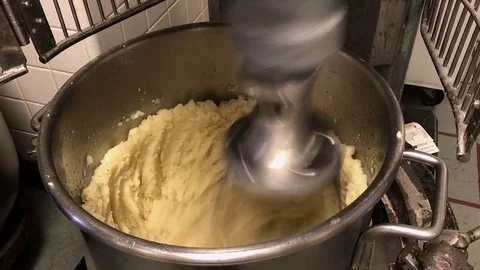 Mashed Potatoes Mixed By Machine in Large Metal Bowl Stock Footage 74701707
