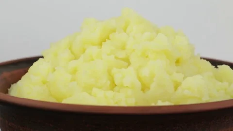 Mashed potatoes in plate, close up. Rotates plate with mashed potatoes Stock Footage 77084851