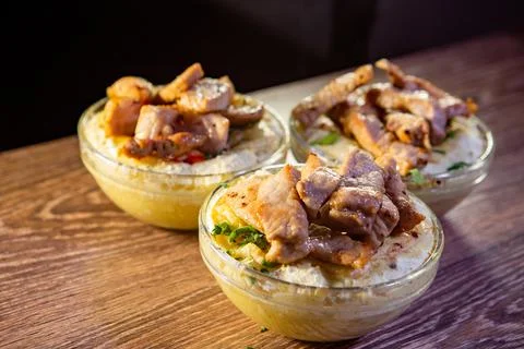 Mashed potatoes in a pot with beef stroganoff Stock Photos