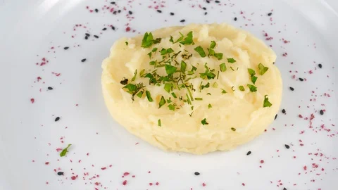 Mashed potatoes, side dish prepared by mashing boiled, peeled potatoes Stock Footage 95674620