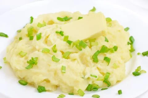 Mashed potatoes on a white plate Stock Photos