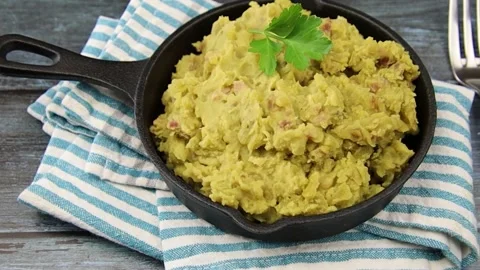 Mashed split peas in a pan on a gray background Stock Footage 170326961