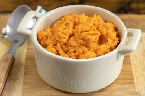 Mashed sweet potato, close up Stock Photos