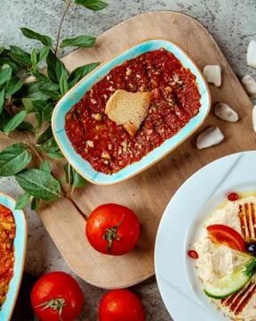Mashed vegetables with walnuts and cracker Stock Photos