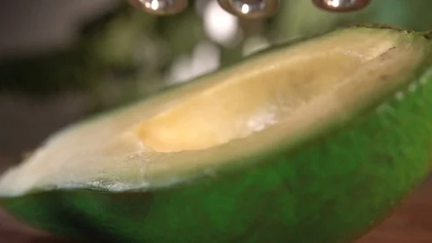 Mashing an avocado in slow motion Stock Footage 122700752