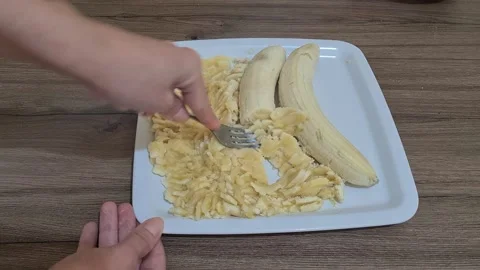  Mashing Bananas  Video stock 157825598