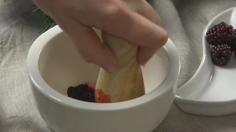 Mashing Blackberries Stock Footage 96583371